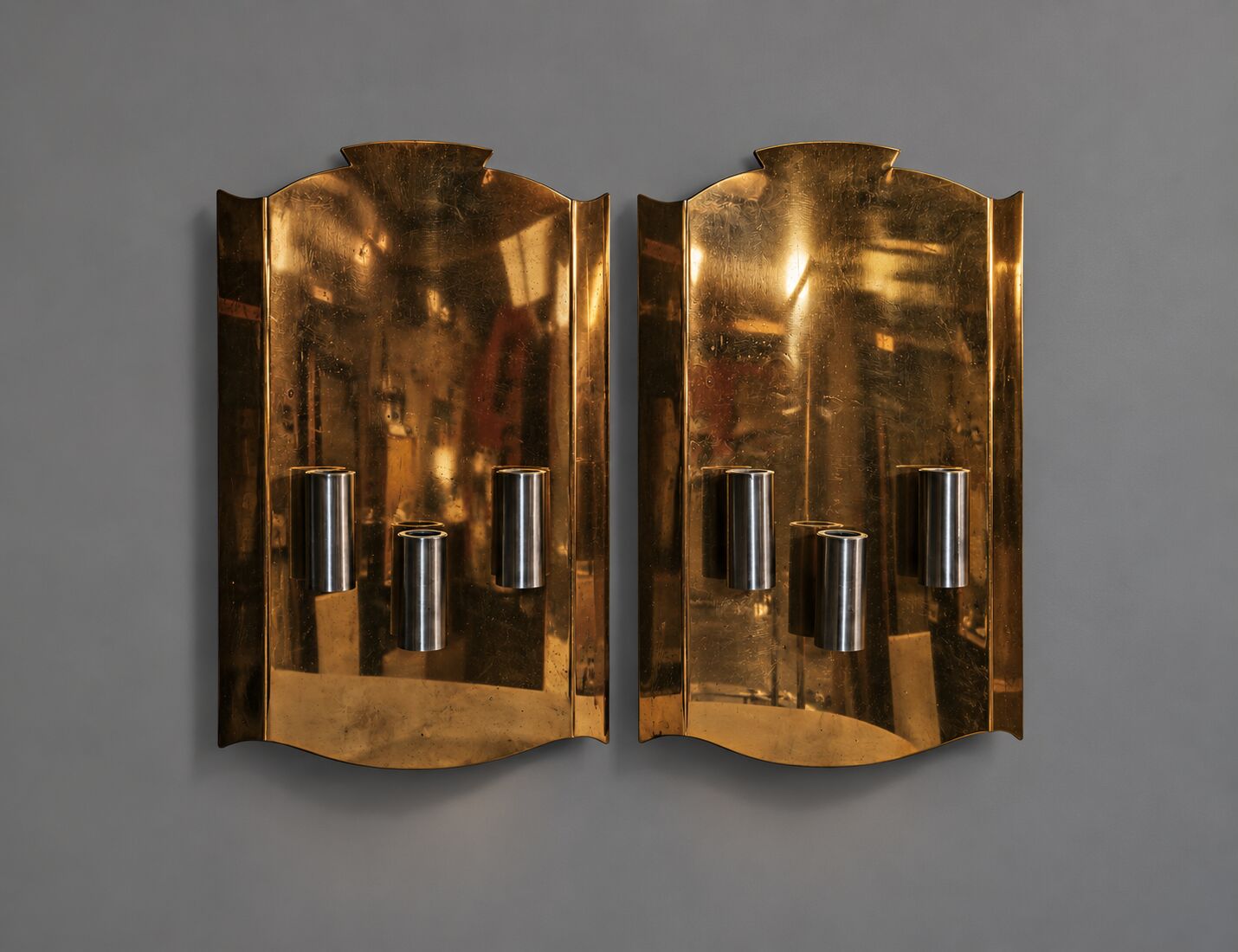Pair of Scandinavian wall sconces in brass, circa 1930.