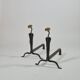 Pair of handforged metal and brass andirons