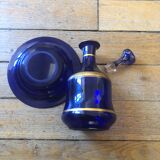 Night carafe and its blue glass saucer