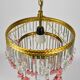 Chandelier pampilles, white and pink drops in clusters.