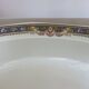 Plat creux " jean boyer " porcelaine de limoges, motif floral années 20