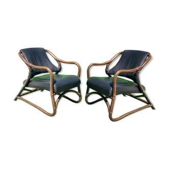 Pair of bamboo lounge chairs with skai leather