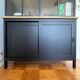 Trendy industrial sideboard in solid black wood