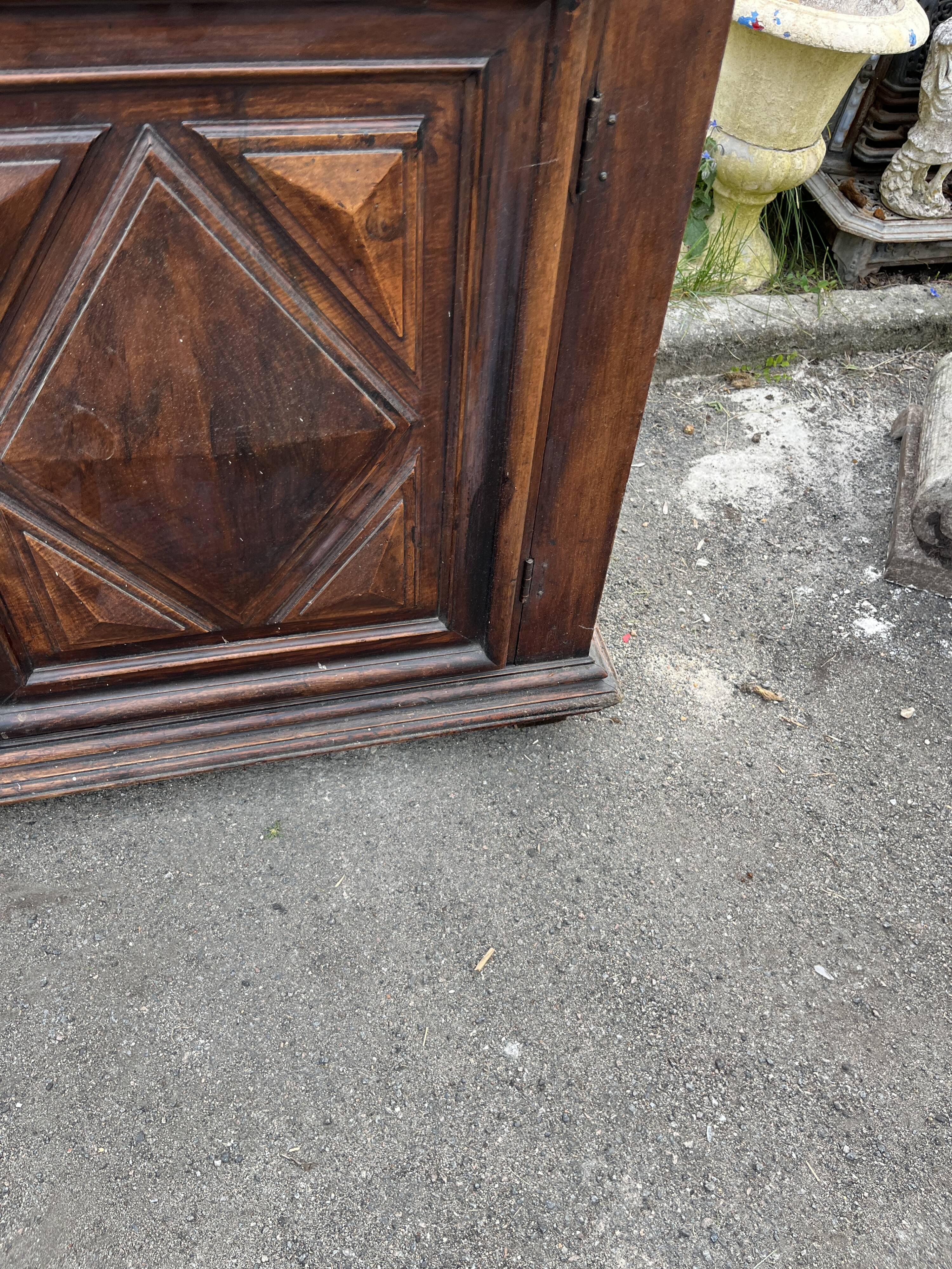 Antique walnut confiturier in Louis XIII style with diamond point panel.