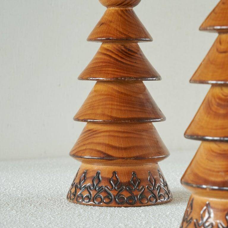 Pair of Scandinavian lacquered wooden candle holders