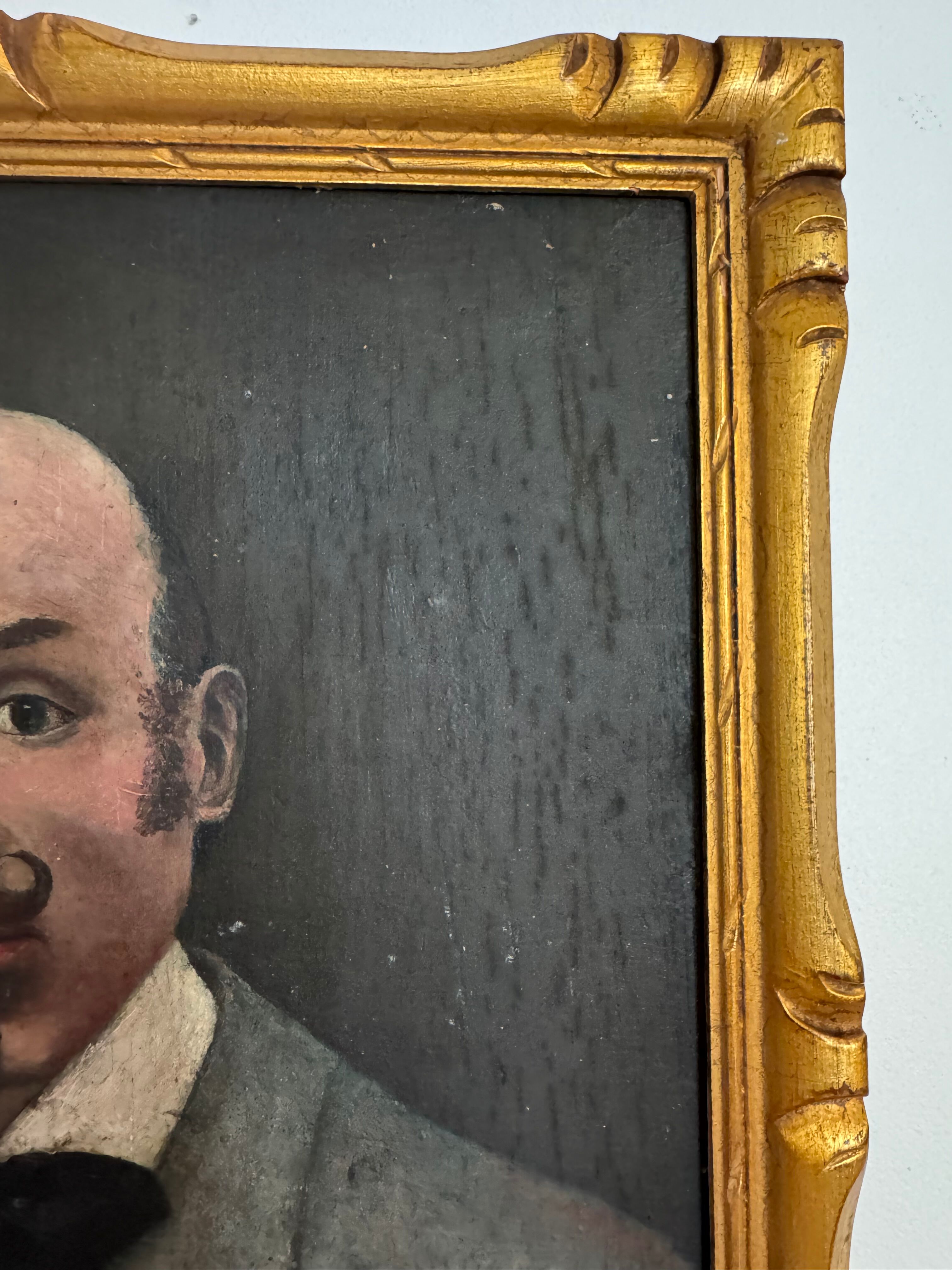 Portrait of a dandy with a moustache from the early 20th century.