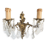 Two bronze spokes with tassels