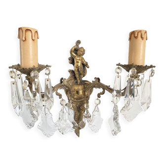 Two bronze spokes with tassels