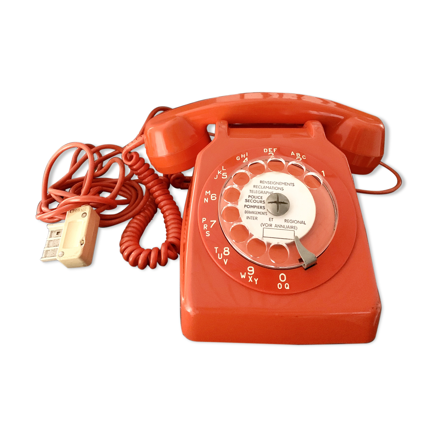 Old orange vintage dial phone