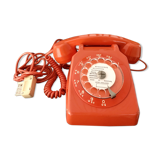 Old orange vintage dial phone