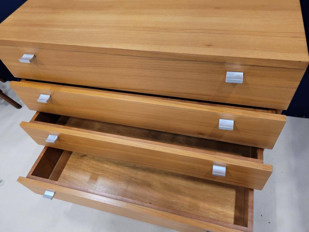 Solid wood chest of drawers with chrome legs from the 1970s.