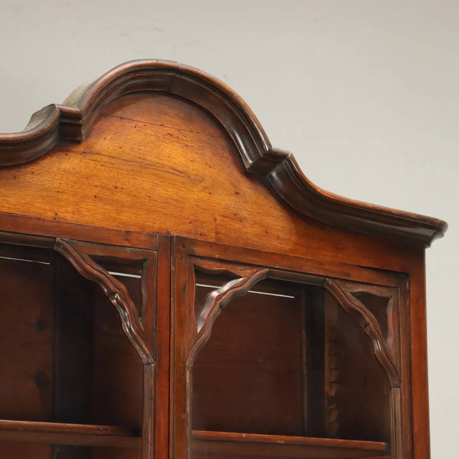 Antique double-bodied display cabinet with walnut drawers, Italy, 20th century.