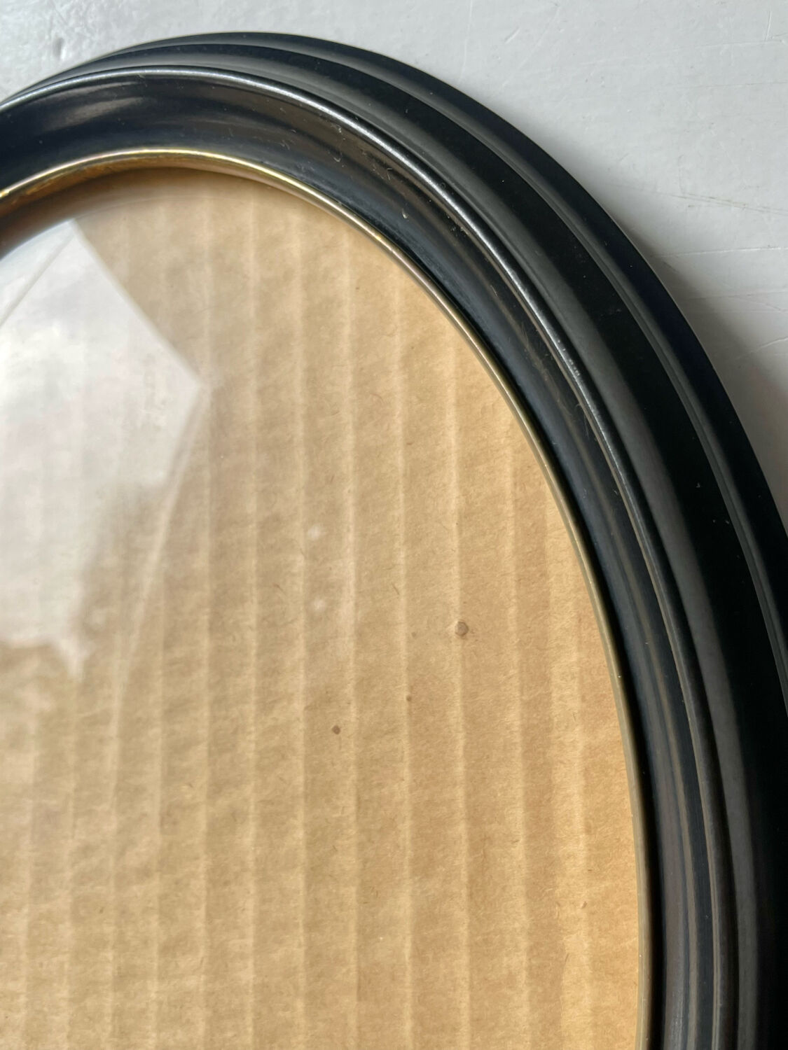 Oval bakelite black vintage frame with convex glass