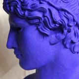 Large bust of a Greek Roman Apollo on a pedestal