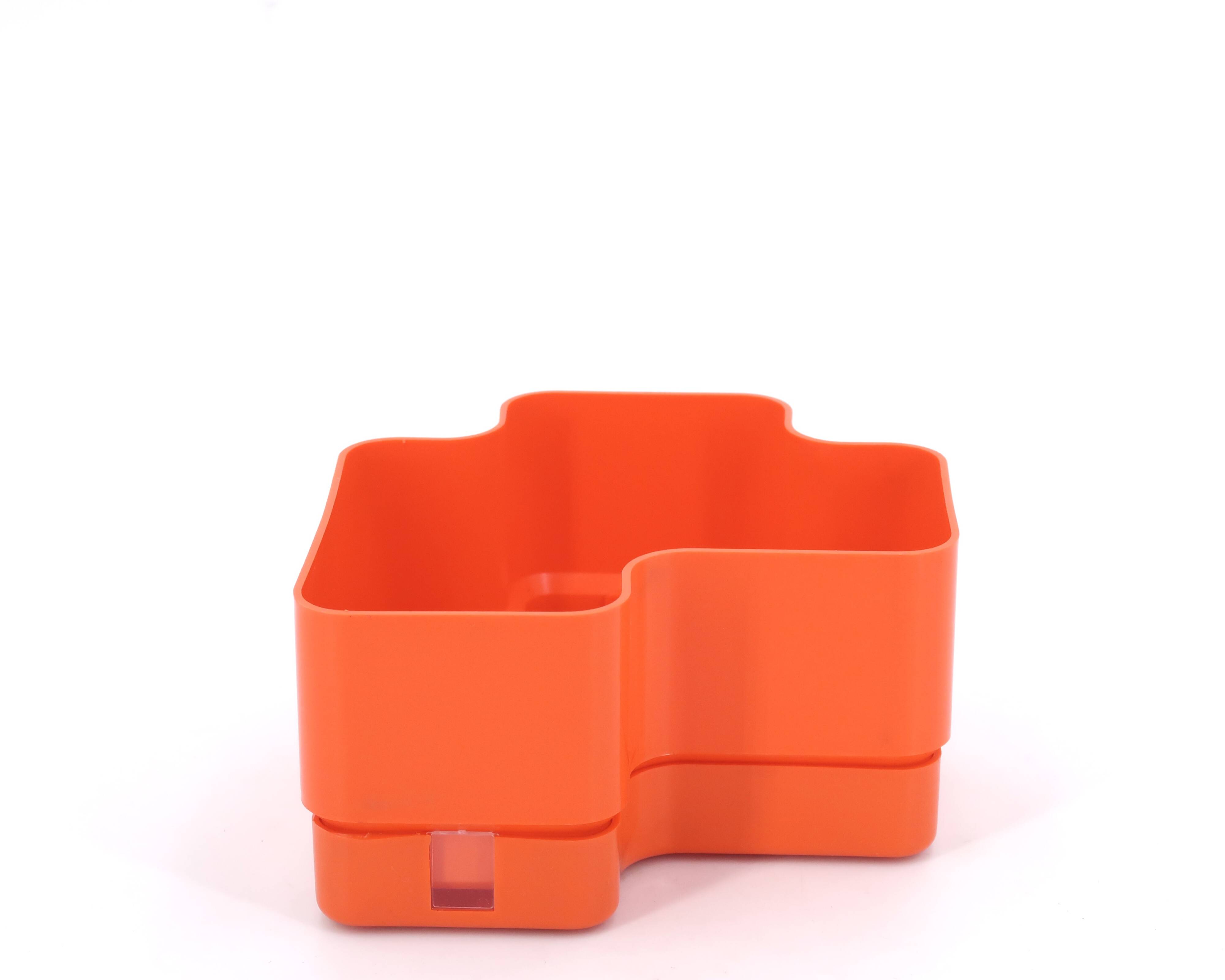 Vastill planter in orange plastic by Michael McCann