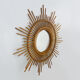 Vintage rattan sun mirror. Year 60