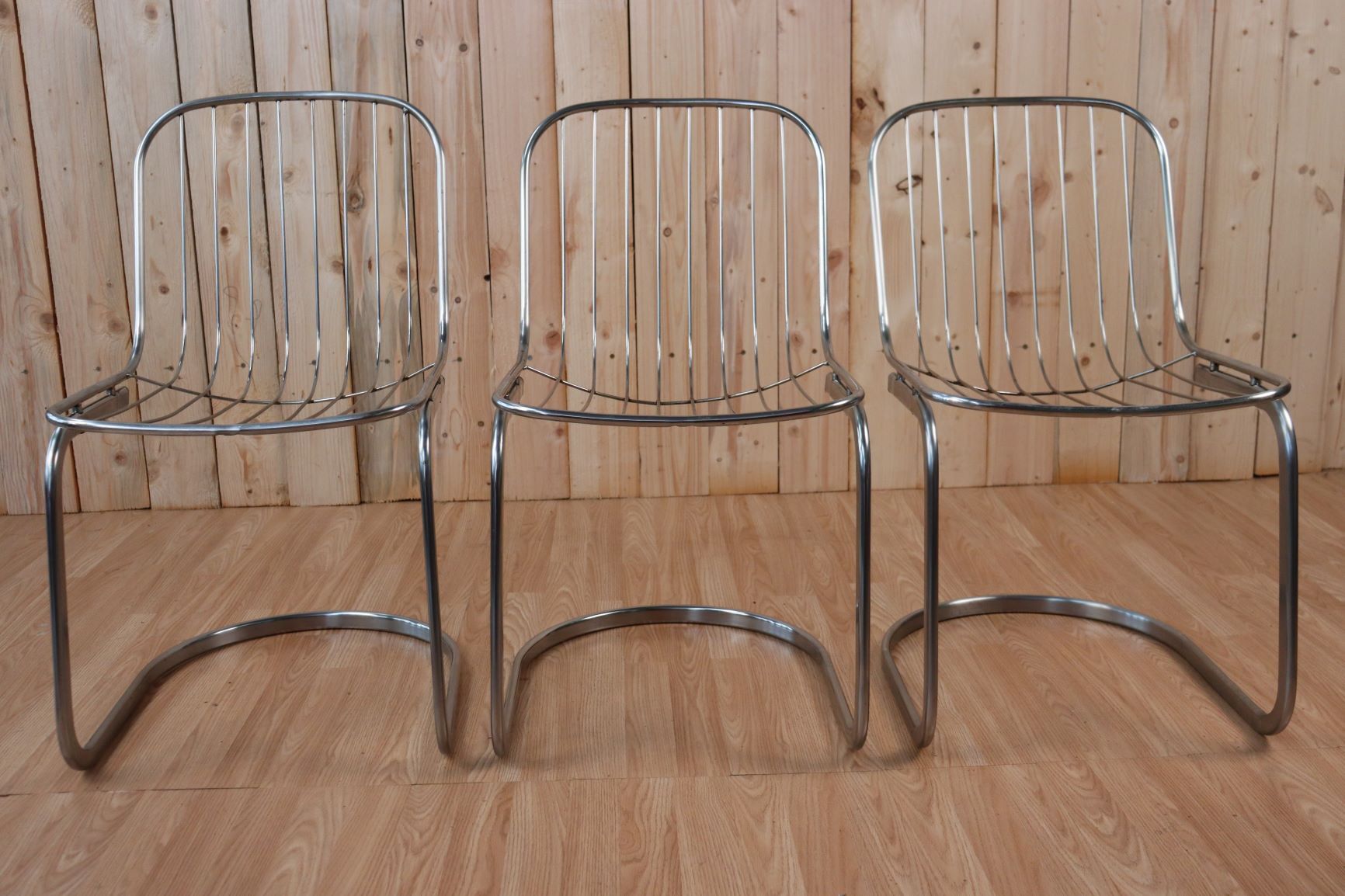 Series of 6 tubular steel chairs