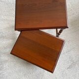 2 wooden nesting tables with molded legs