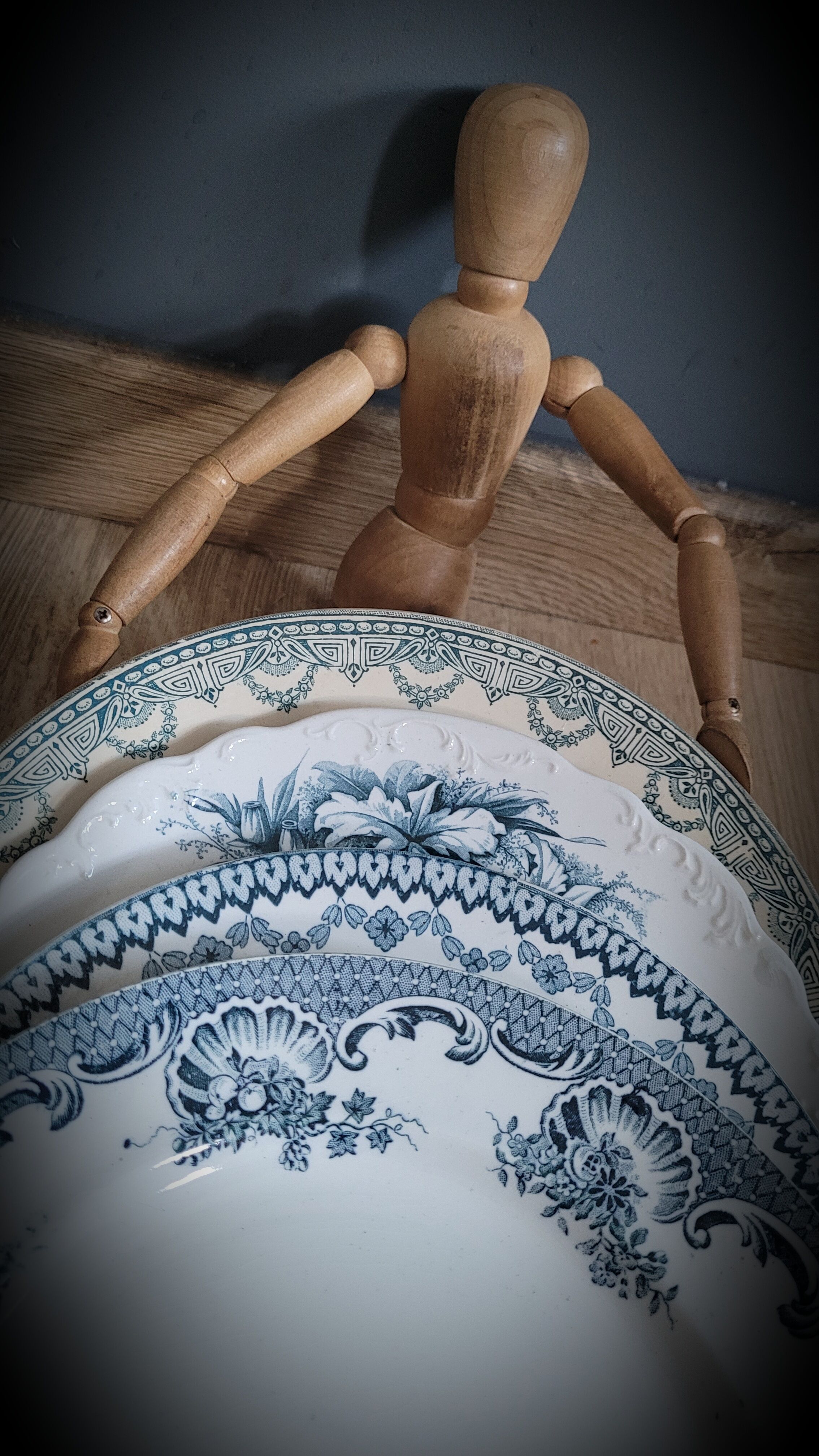 Quartet of mismatched blue plates