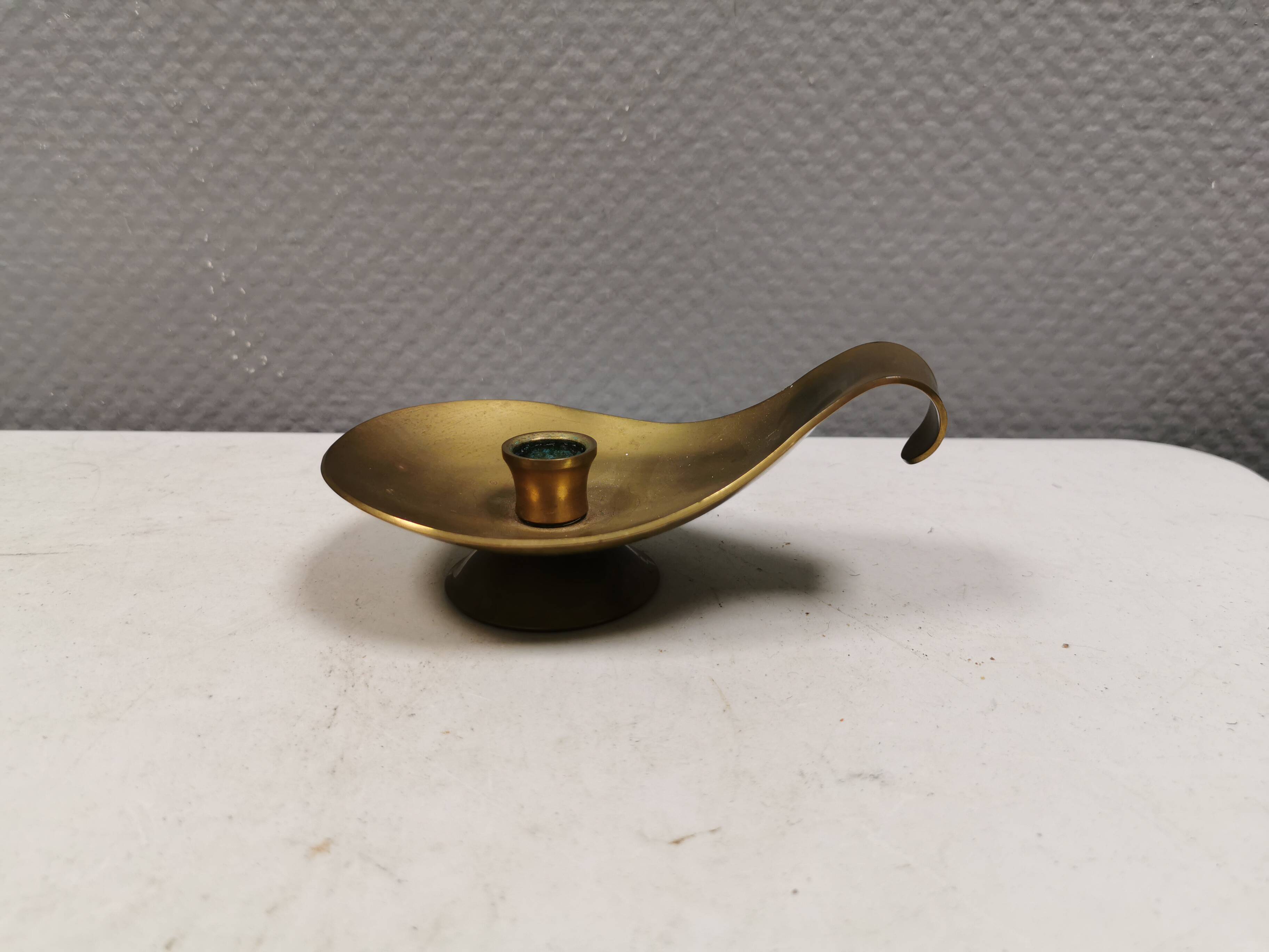Brass candlestick for a single candle