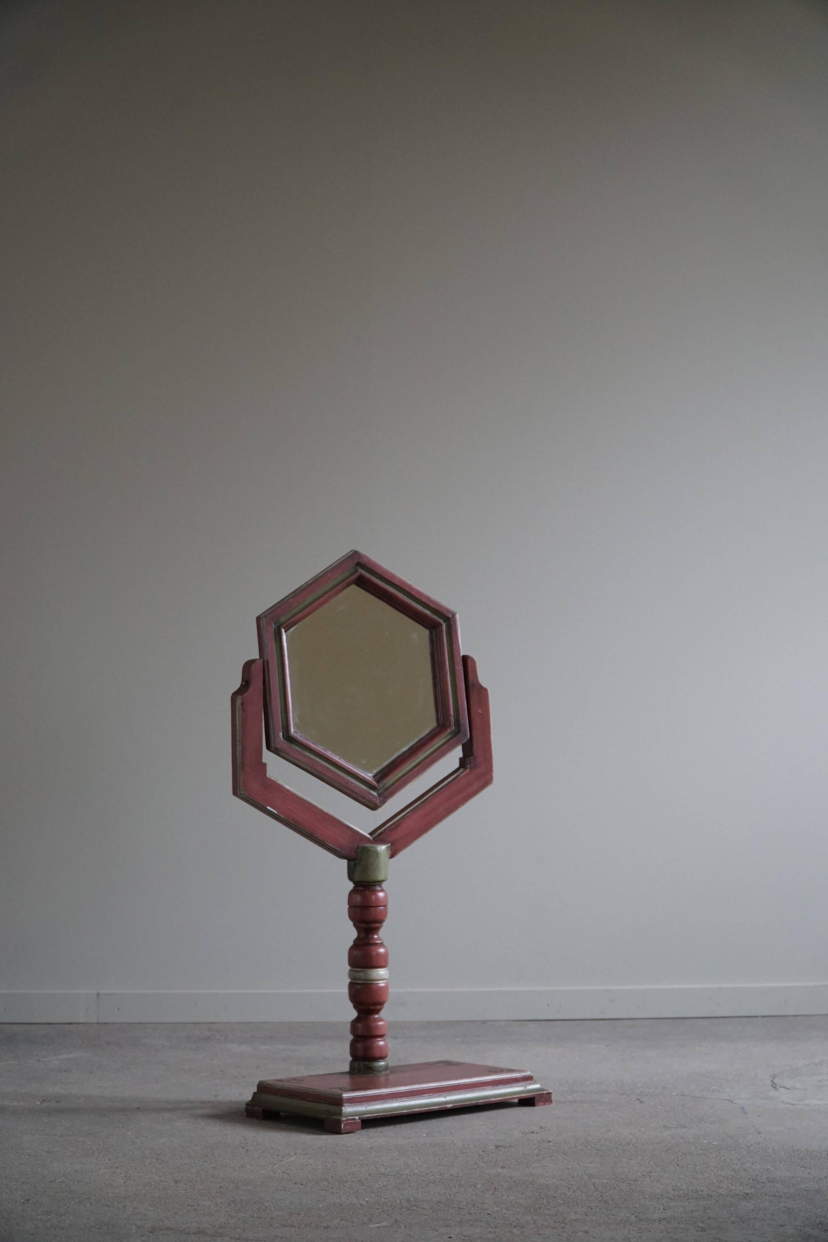 A pine table mirror by a Swedish cabinetmaker, folk art, early 20th century.