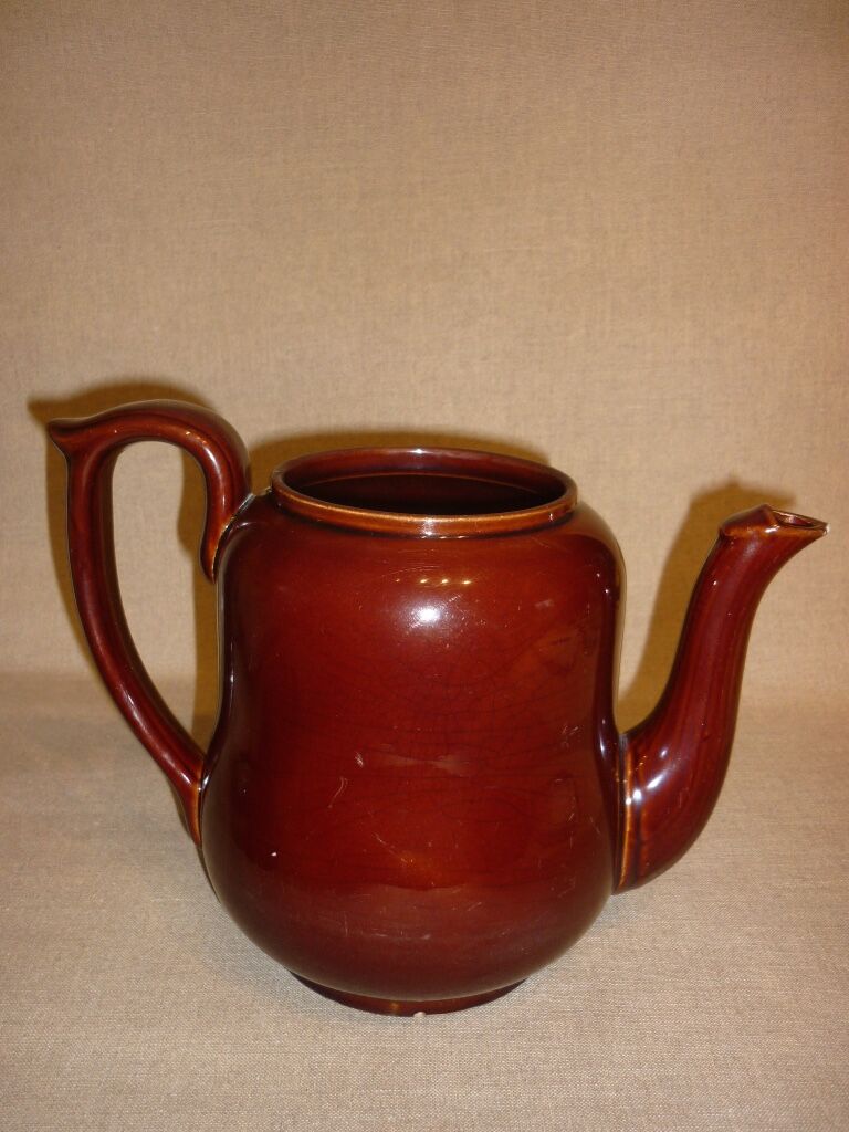 Very large brown ceramic coffee maker