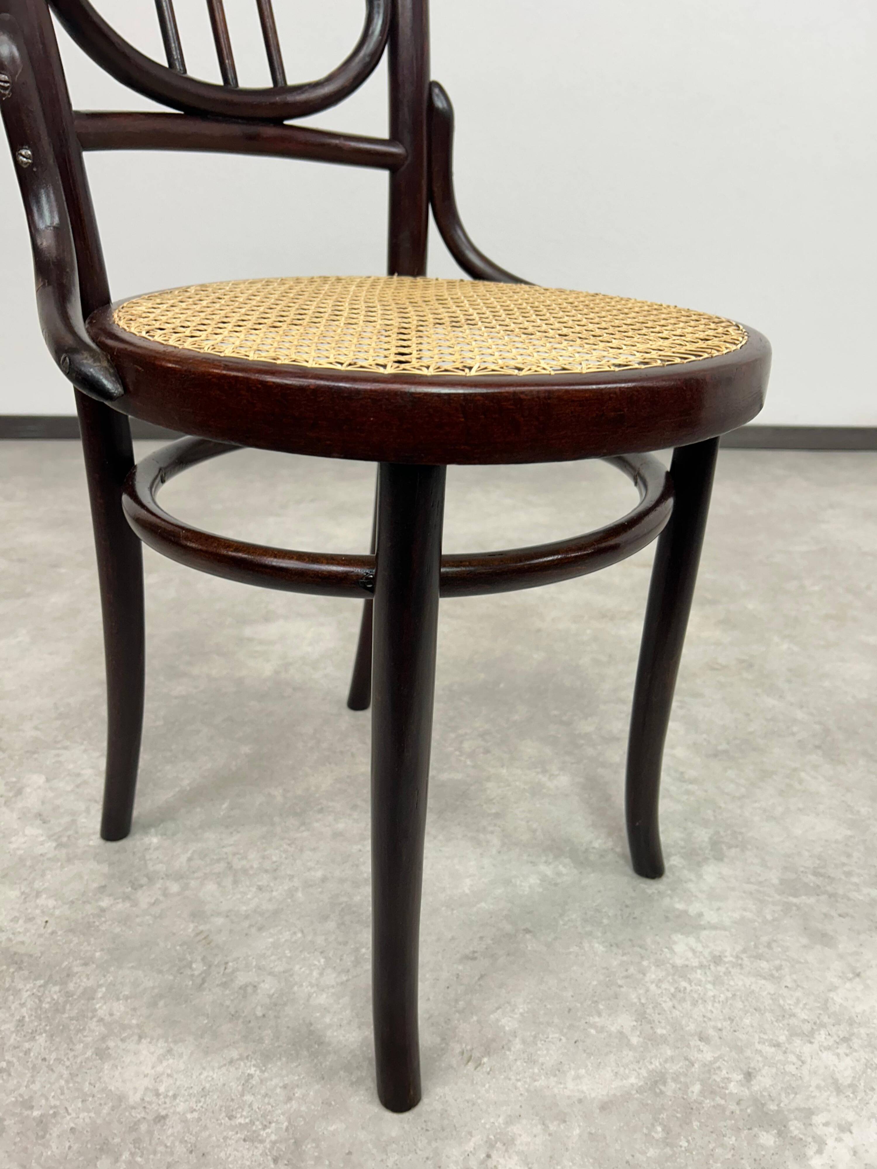 Curved wooden chair attributed to Thonet.