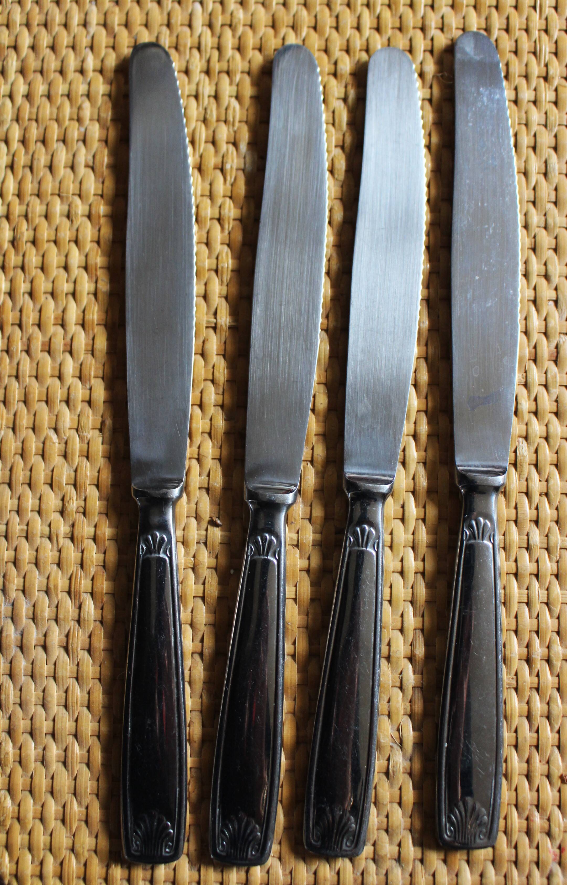 Mismatched set of 8 forks + 8 vintage shell stainless steel knives