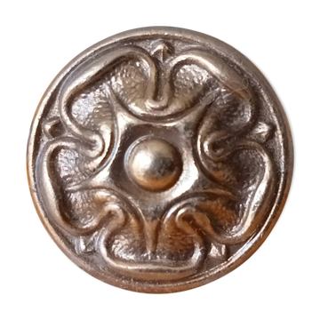 Vintage Empire style furniture handle in gold.