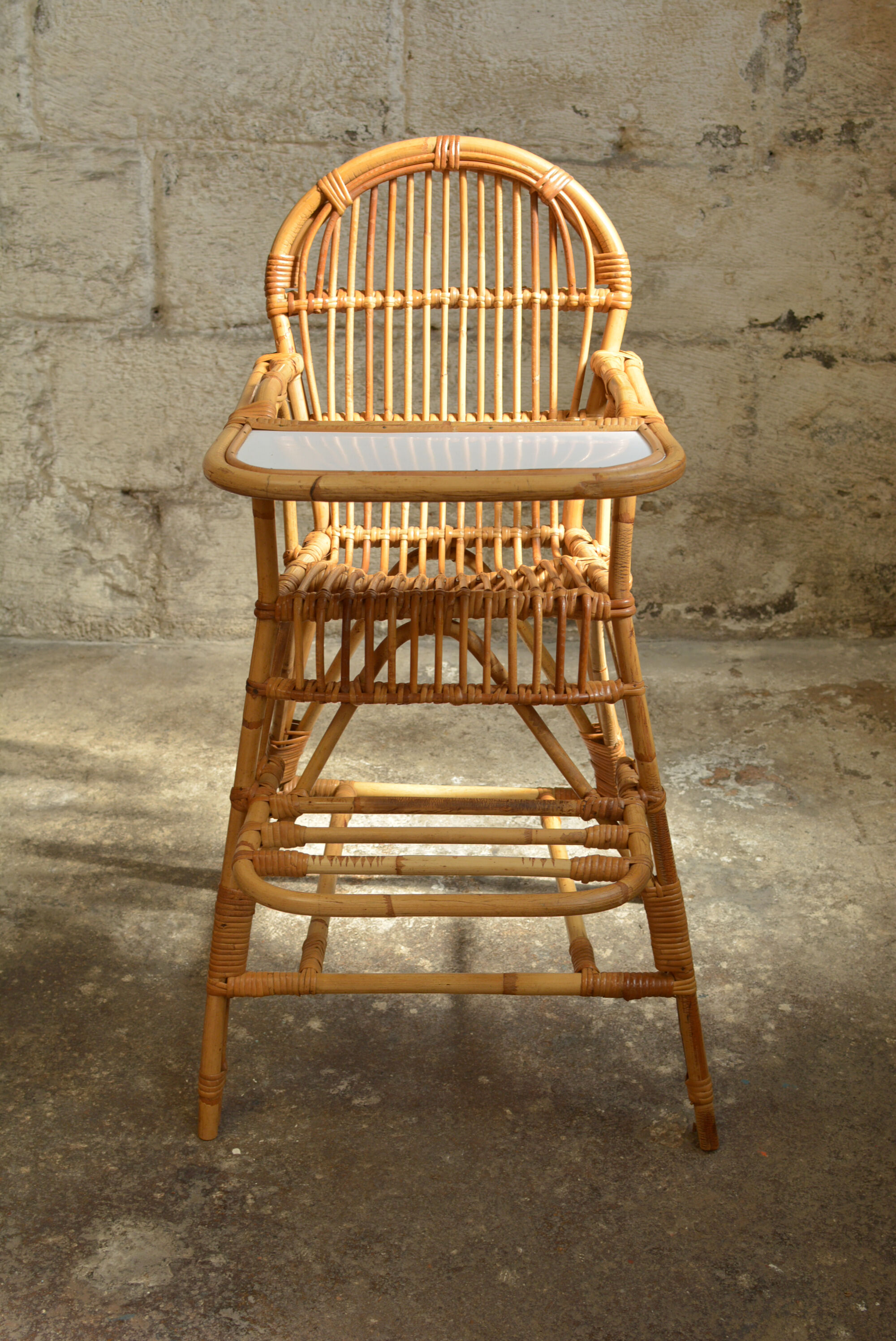 Vintage rattan high chair