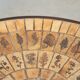 Round coffee table by Roger Capron