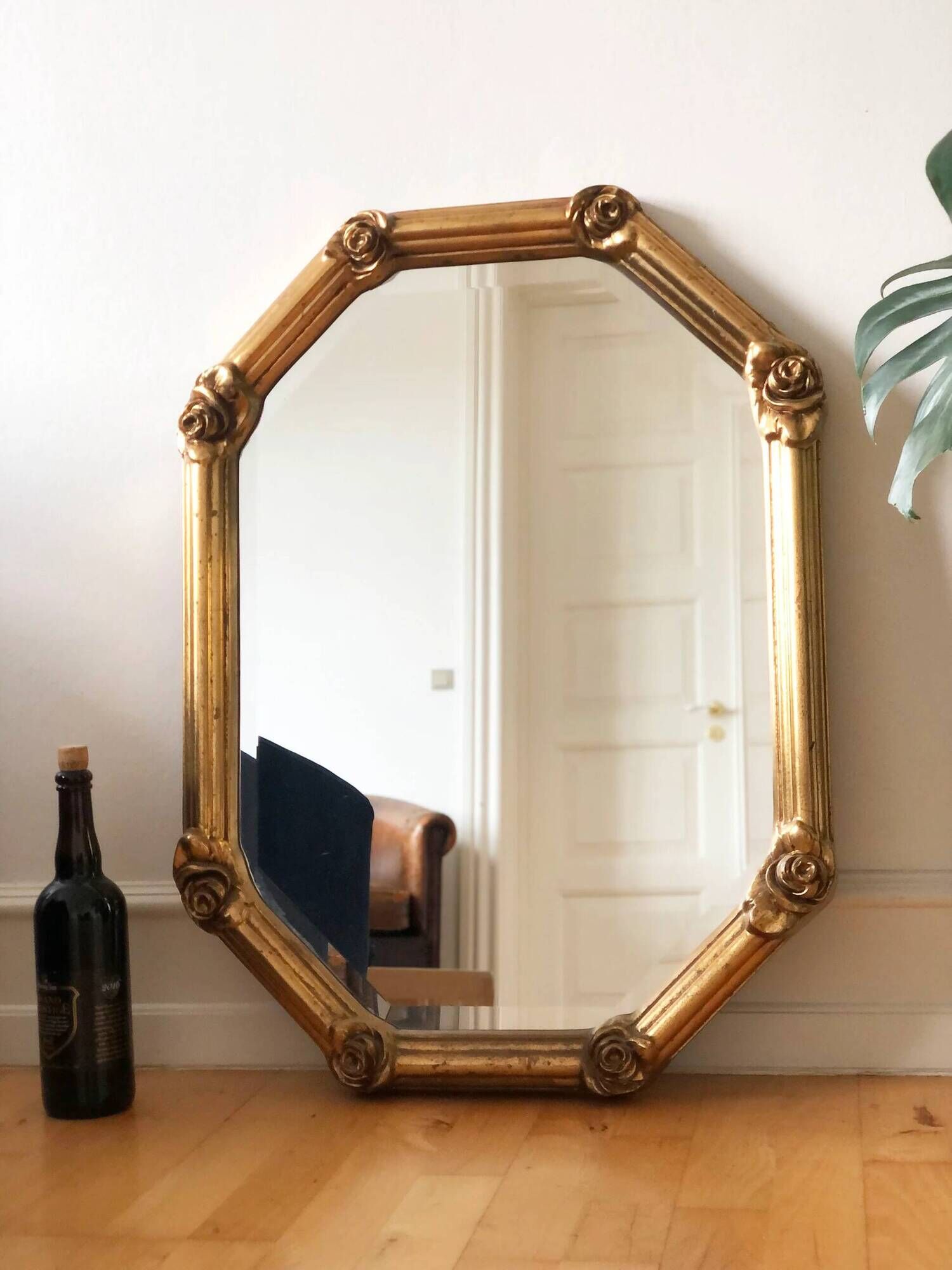 Vintage octagonal giltwood bevelled mirror with rose accents