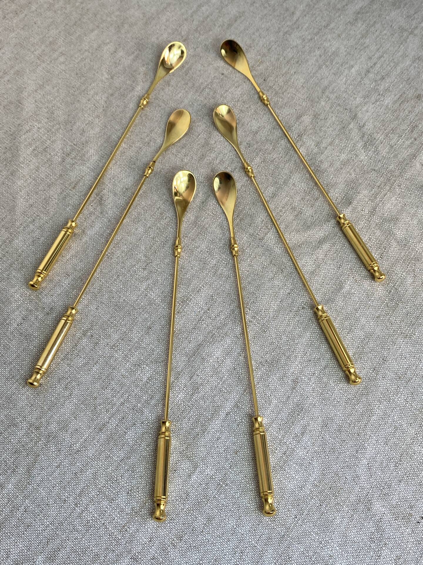 Long coffee or cocktail spoons in gold plating