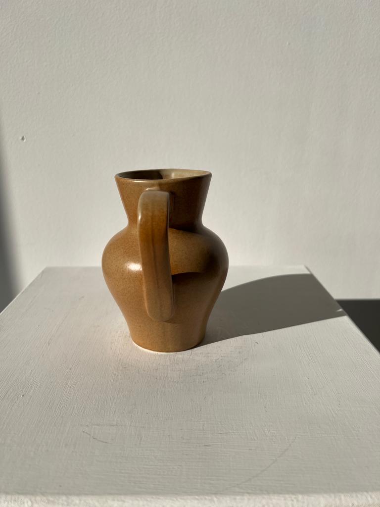 Pitcher in light beige sandstone