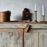 The patinated sideboard