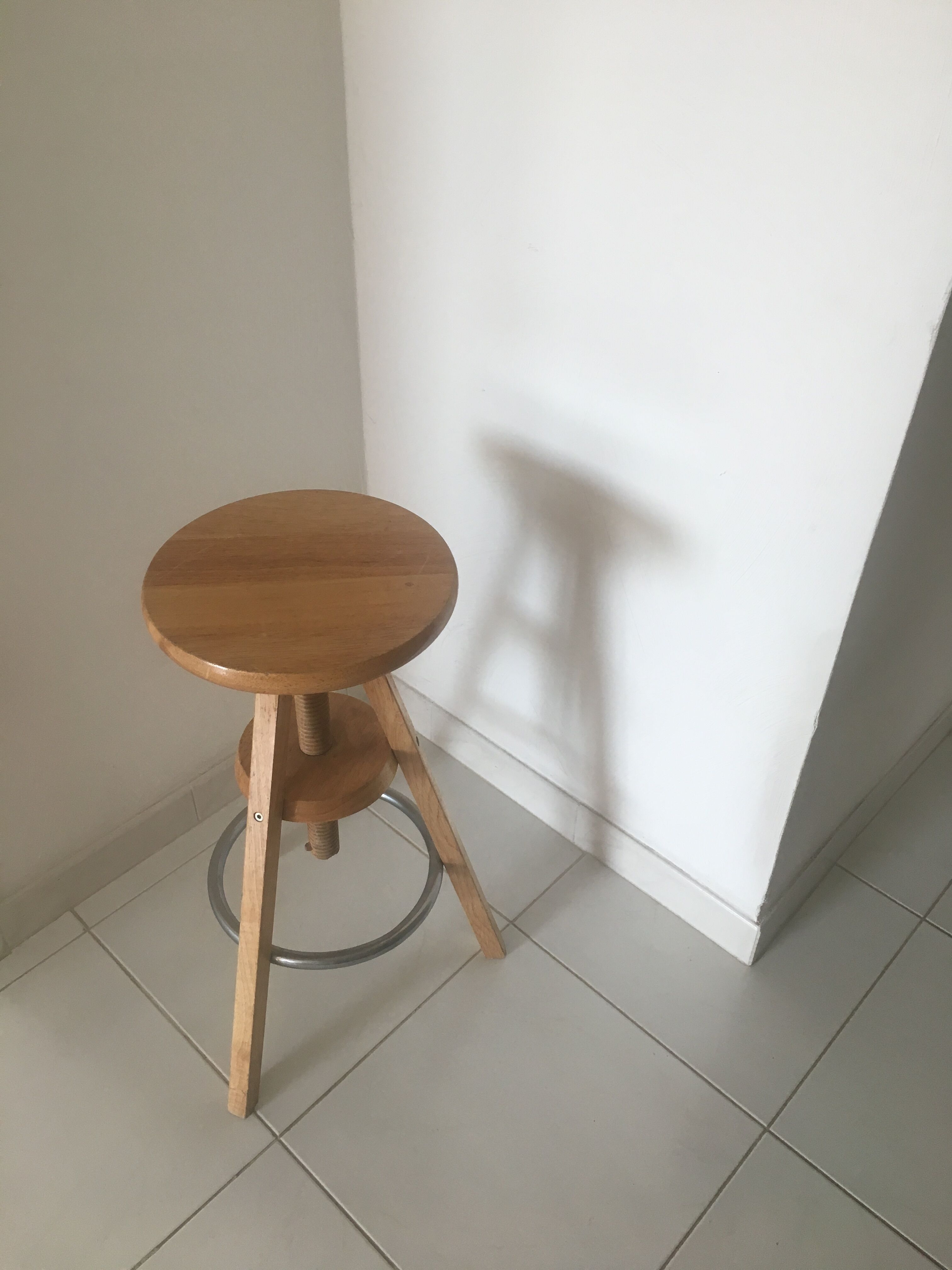 Wooden and metal tripod screw stool
