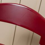 Red plastic-seat stacking chair with chrome frame by Paolo Favaretto for Assisa (Italy 1986) – vintage design