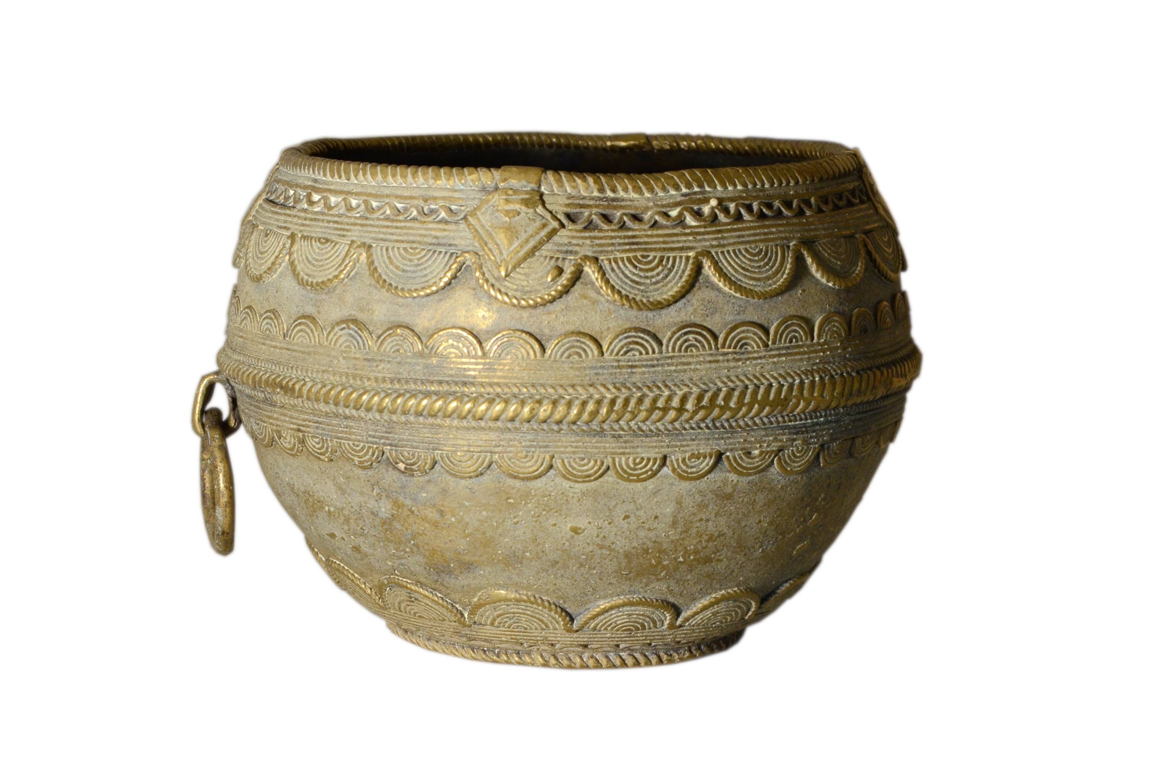 Ancient bronze ethnic pot, handcrafted in India.