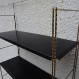 Metal thong wall shelf