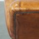 Cognac-colored antique sheep leather armchair
