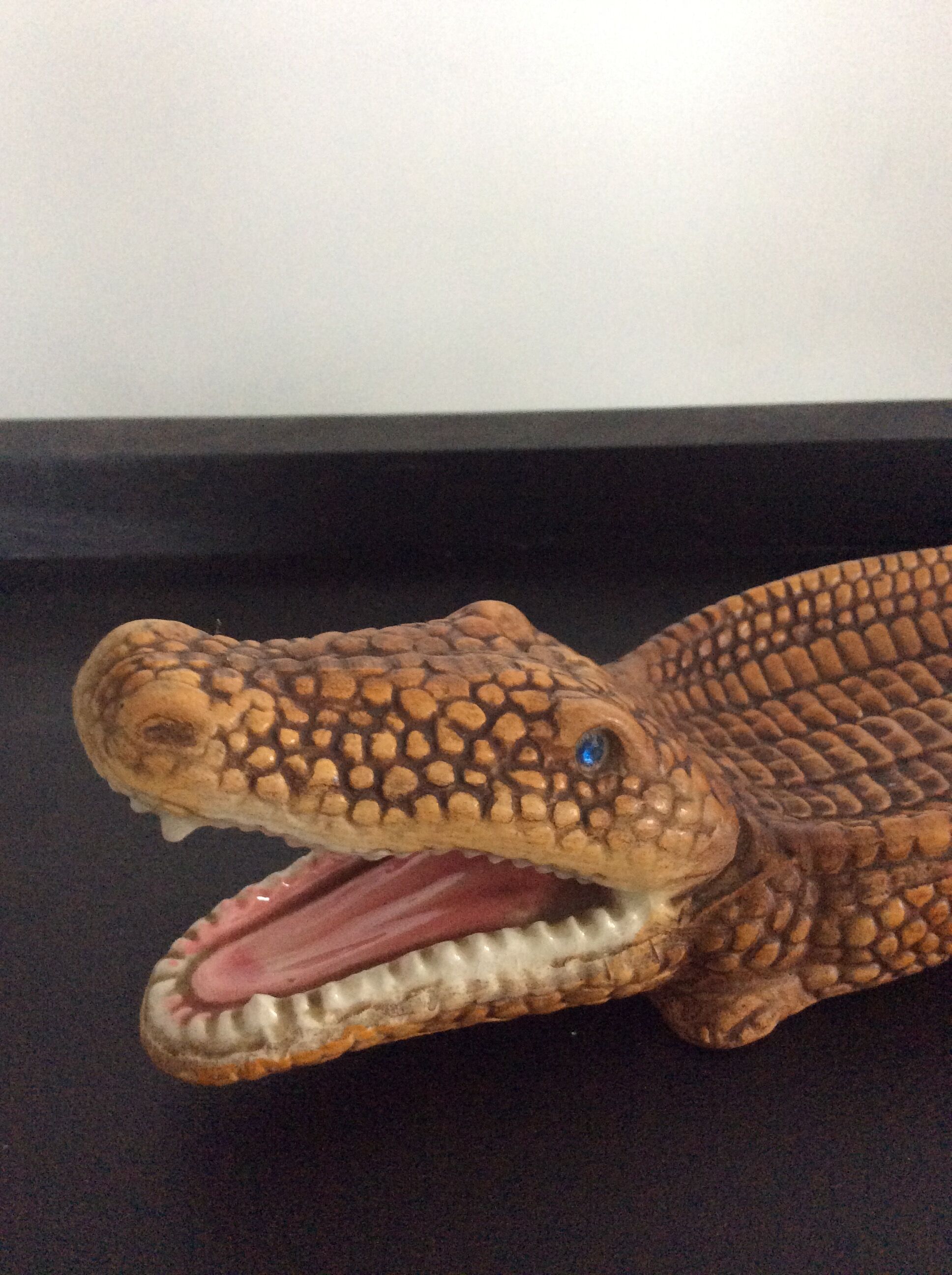 Empty vintage ceramic crocodile pocket