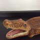 Empty vintage ceramic crocodile pocket