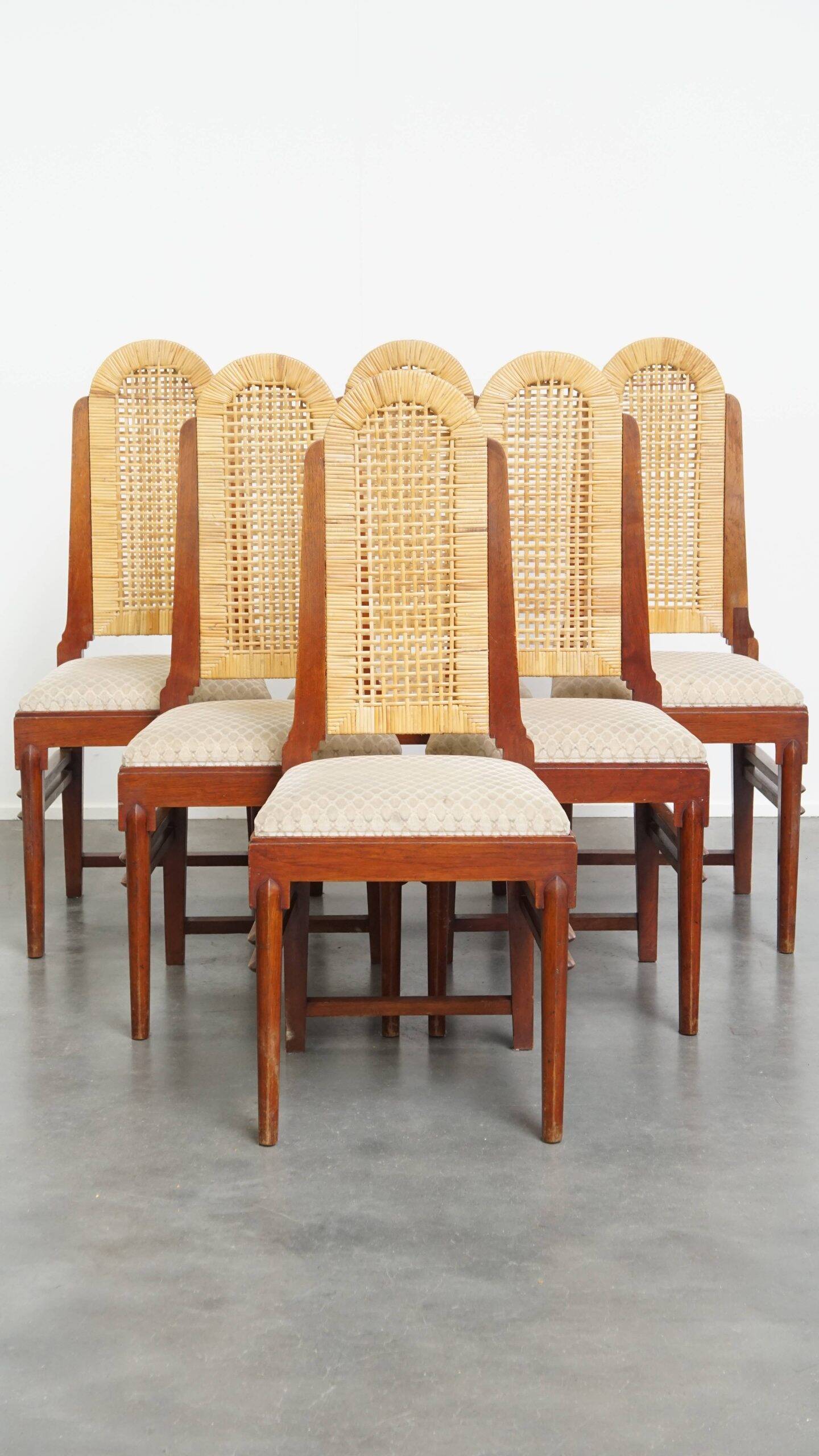 et of 6 wooden Art Deco design dining chairs with a wicker seat and backrest