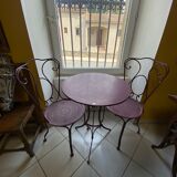 Set of two chairs and wrought iron pedestal table
