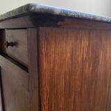 Vintage bedside table in the shape of a wooden column and a gray marble top