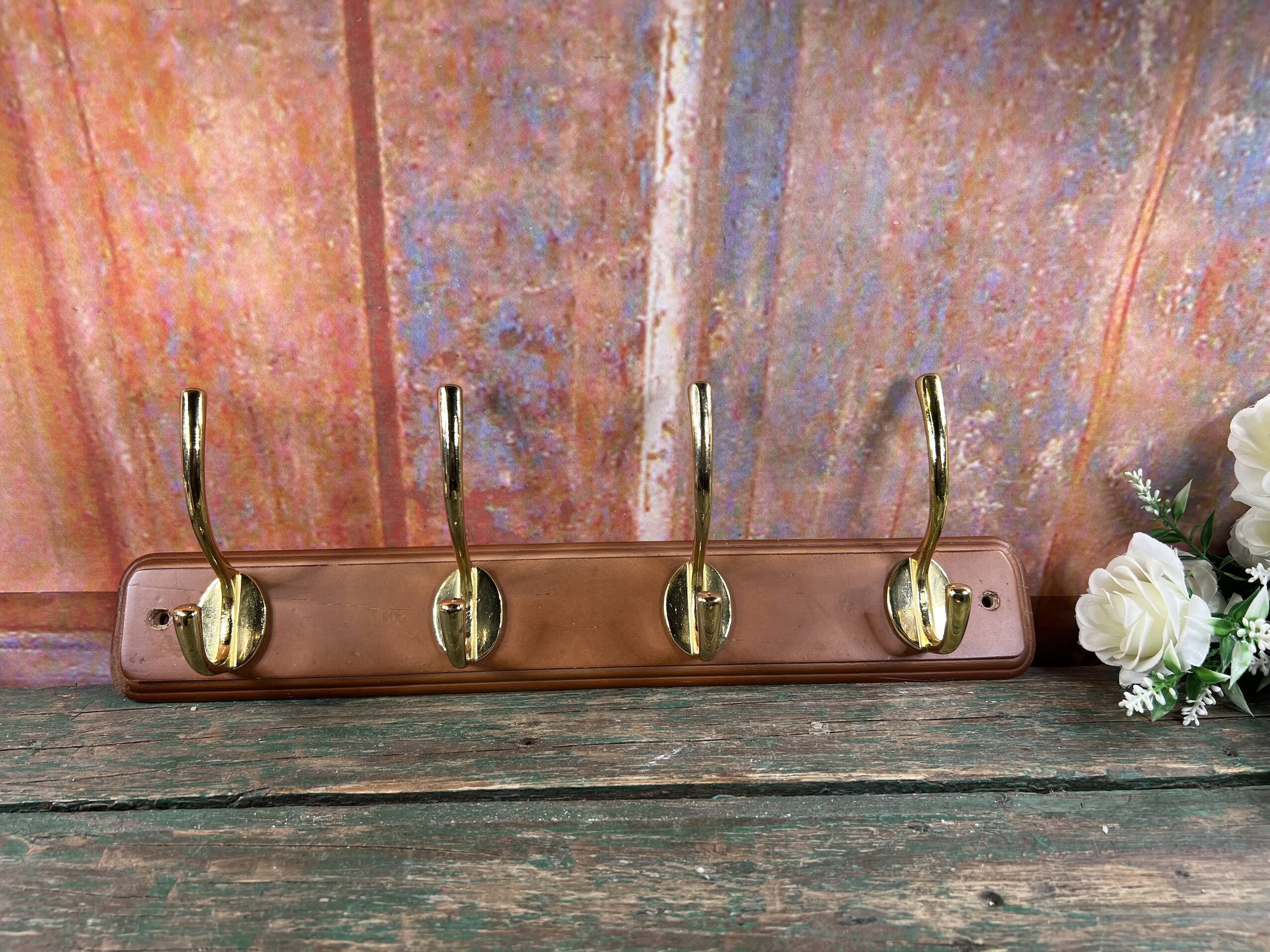 Wall coat rack with 4 brass hooks