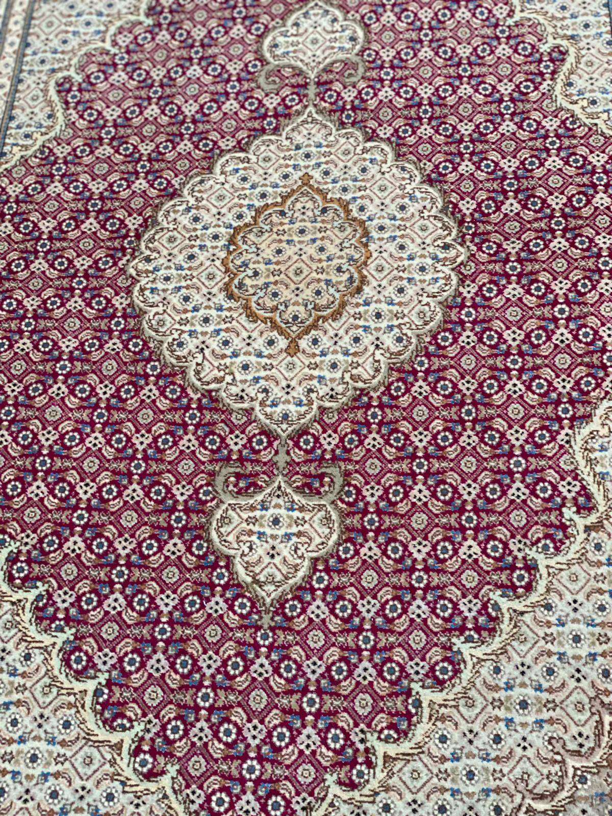 Handmade burgundy wool Persian rug 100x155cm