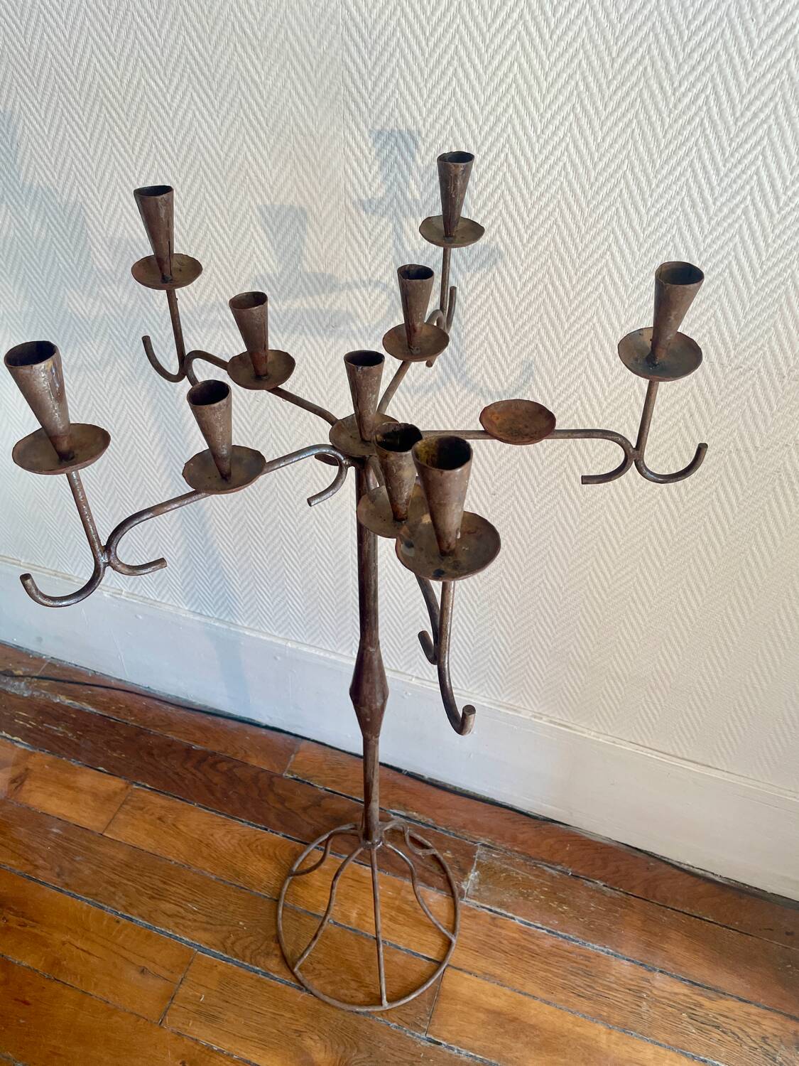 Large standing candlestick in folk art forged metal