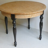 Round table in coloured cerused oak, waxed coloured feet
