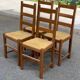 4 solid wood and straw chairs, farmhouse style from the 1950s.